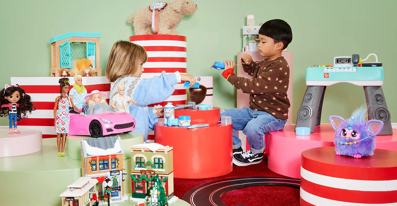 Two kids playing with John Lewis&#039; top Christmas toys for 2023