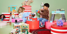 Two kids playing with John Lewis' top Christmas toys for 2023