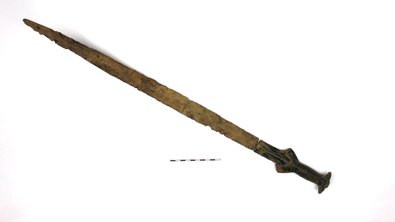 The blade of the bronze sword is broken in one place, but the ornately-decorated ancient weapon is otherwise intact. Archaeologists estimate it is about 3300 years old.