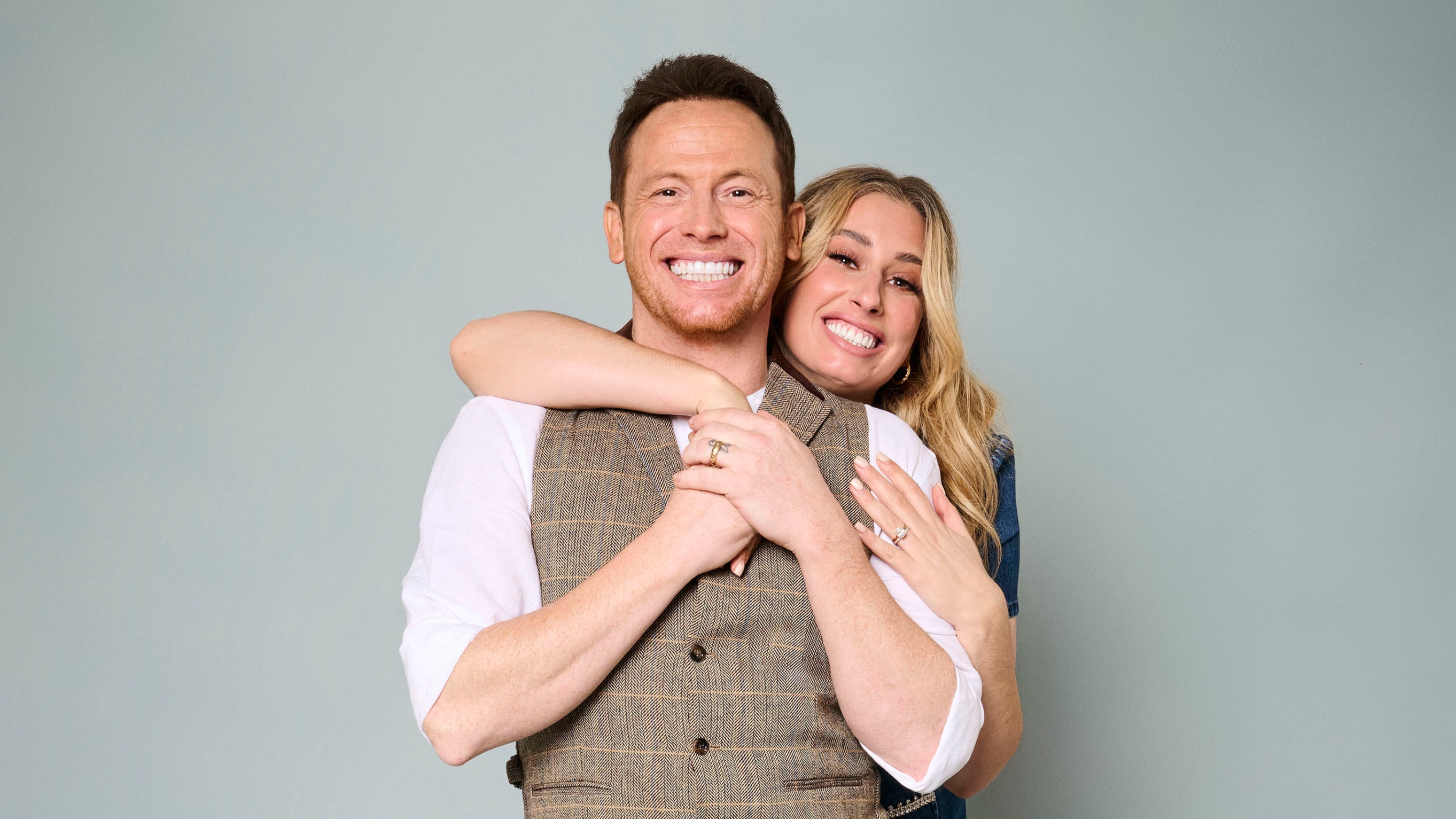 Joe Swash and Stacey Solomon hugging and smiling for the camera