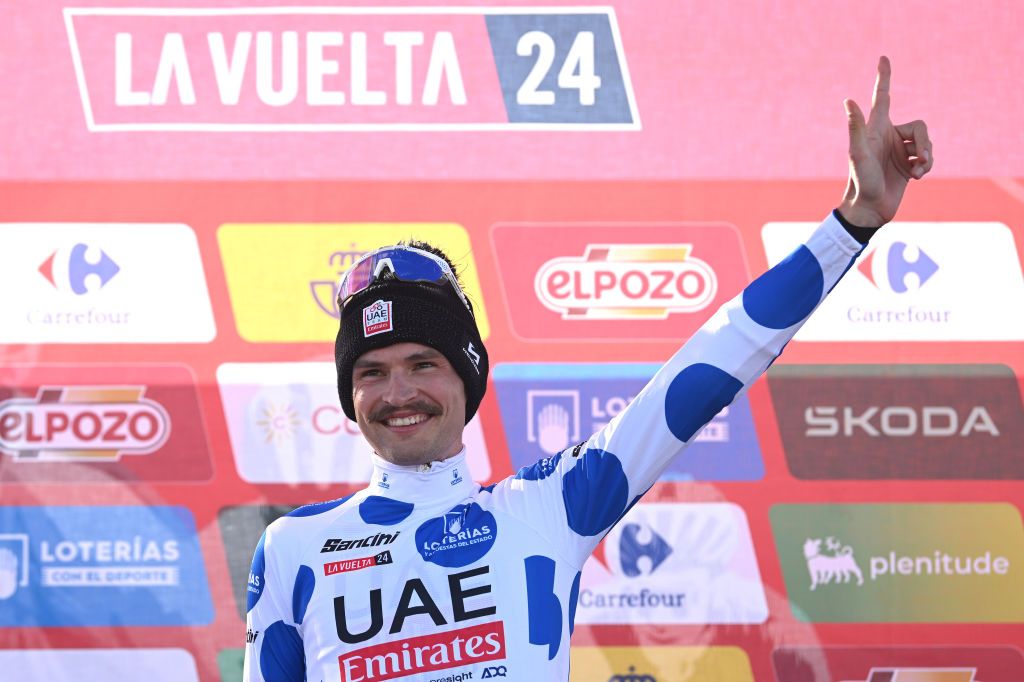 PICON BLANCO BURGOS SPAIN SEPTEMBER 07 Jay Vine of Australia and UAE Team Emirates celebrates at podium as Polka Dot Mountain Jersey winner during the La Vuelta 79th Tour of Spain 2024 Stage 20 a 172km stage from Villarcayo to Picon Blanco 1491m UCIWT on September 07 2024 in Picon Blanco Burgos Spain Photo by Dario BelingheriGetty Images