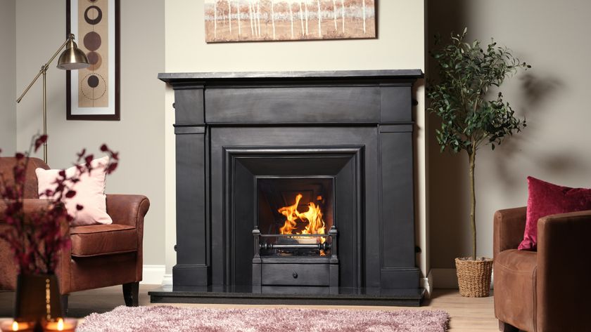 black fireplace with insert in living room