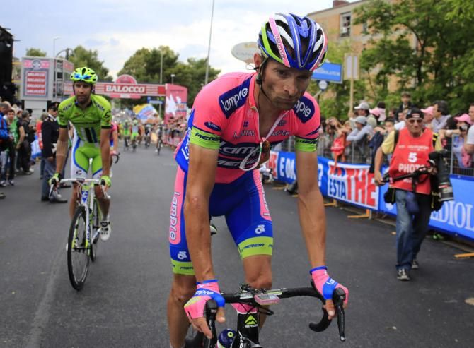 Michele Scarponi (Lampre-Merida) makes his way to his team bus at the finish