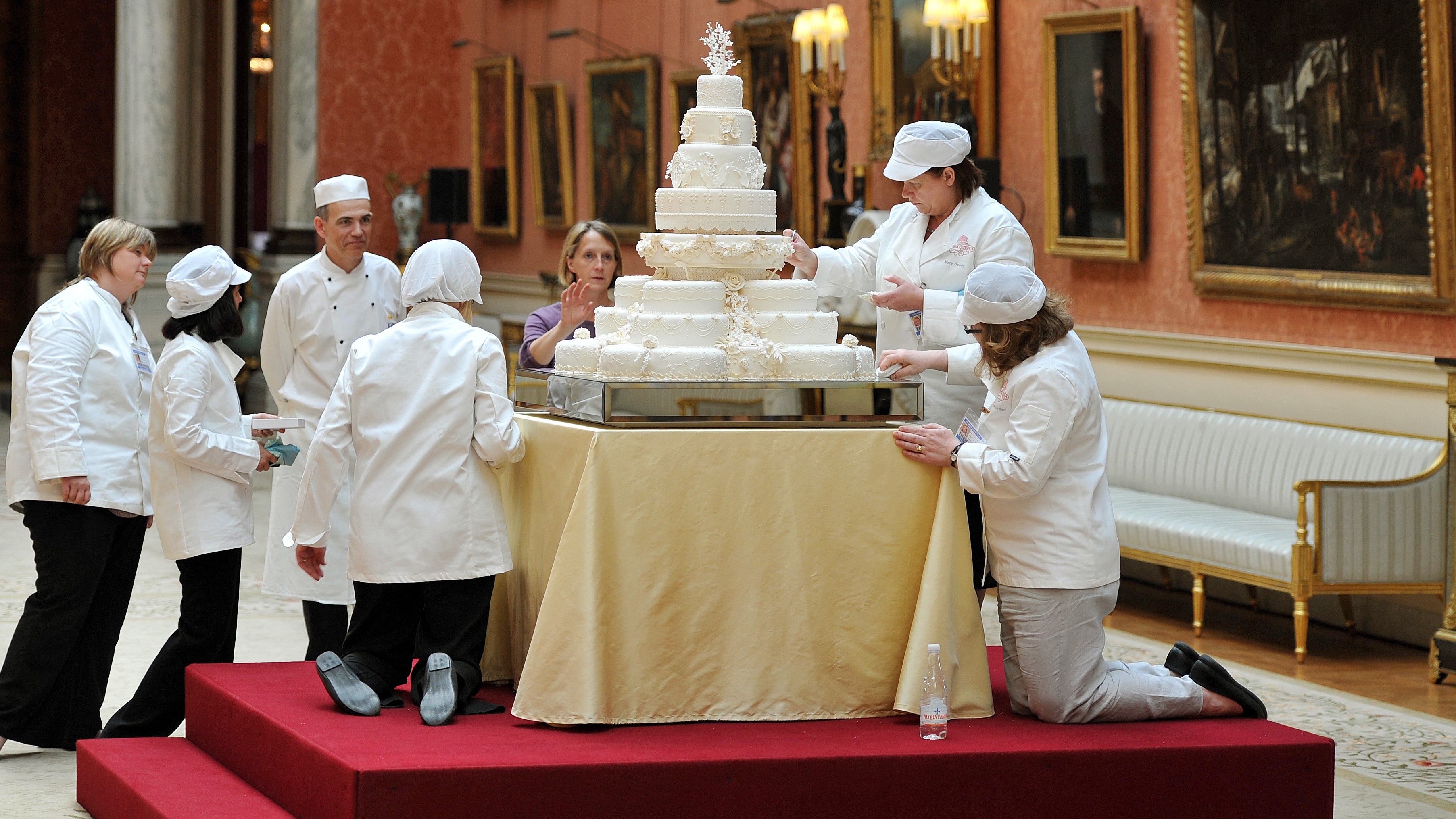 The team led by Fiona Cairns that made the Royal Wedding Cake, put on the finishing touches for Prince William and Kate in the Picture Gallery of Buckingham Palace in central London on April, 29, 2011