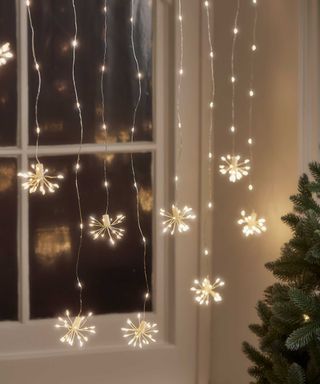 Christmas string cluster lights from Cox & Cox in window