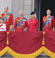 Royals including The King and Queen standing on the balcony in uniforms during Trooping the Colour 2023