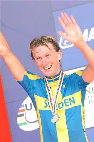 Gustav Larsson (Sweden) is happy with his medal.