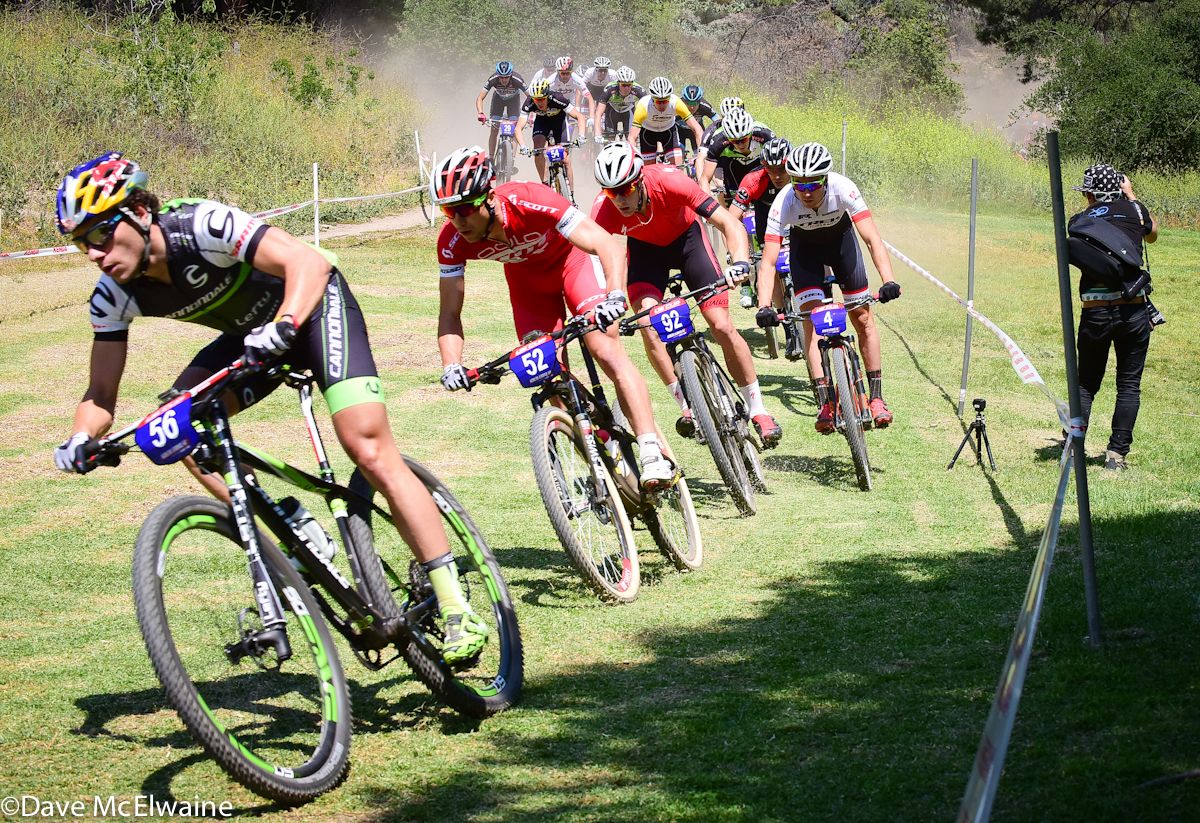 Henrique Avancini (Cannondale) leading during the start loop but Schurter was glued to his wheel
