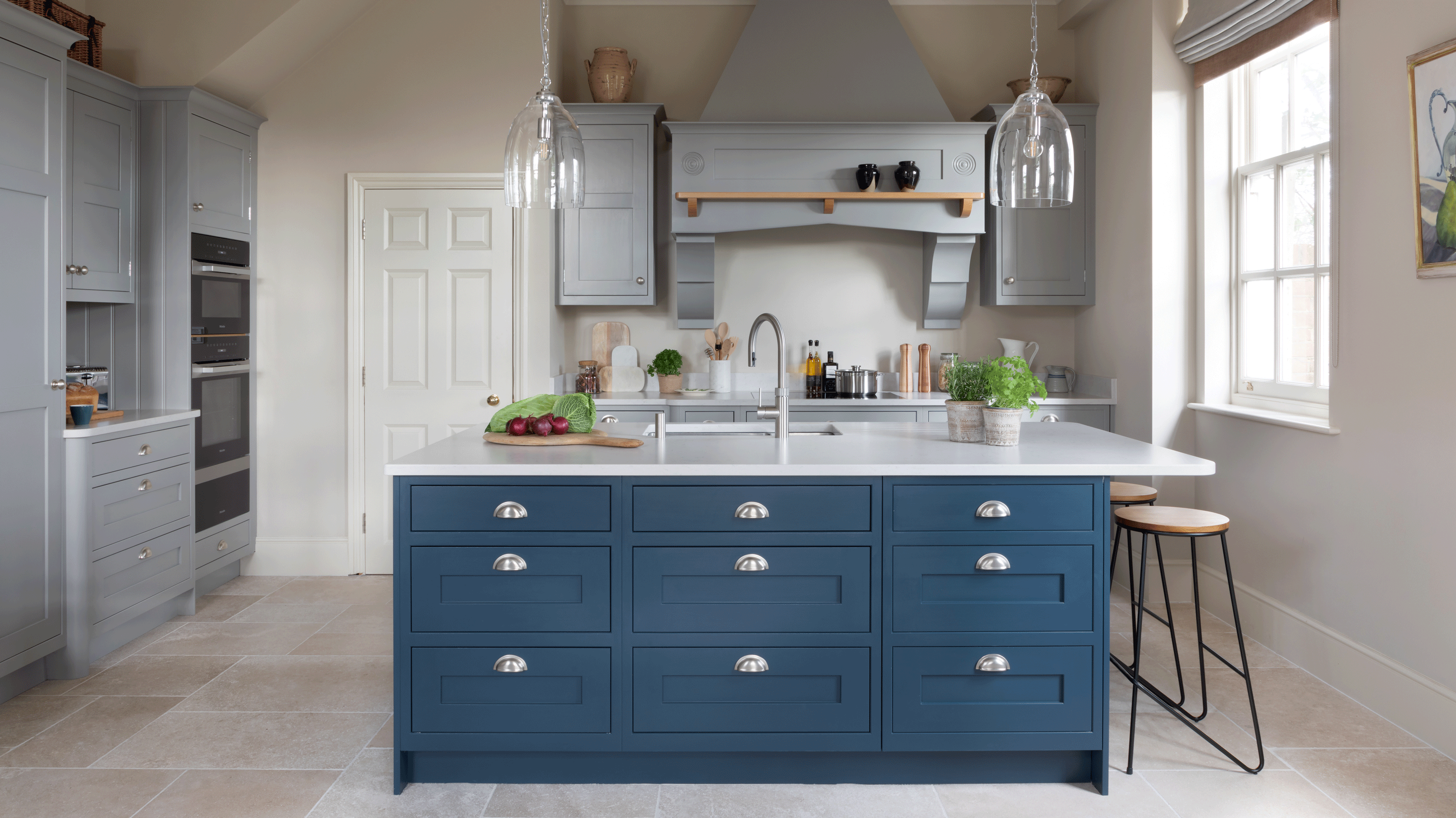 Blue kitchen island with drawers