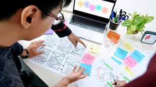 UX designers work on a UX design on a budget
