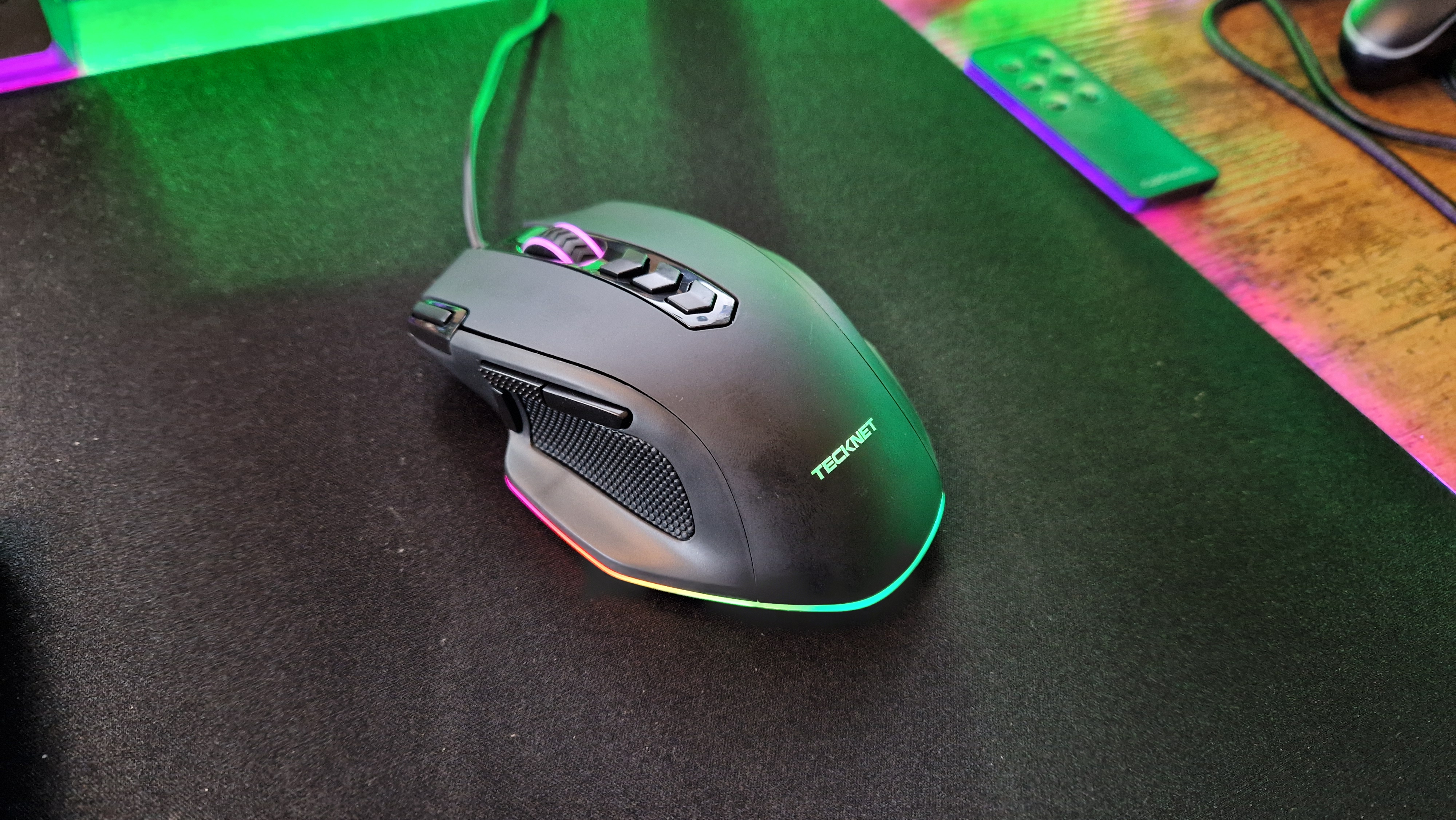 Tecknet Wired Gaming Mouse from the left side on a mouse mat