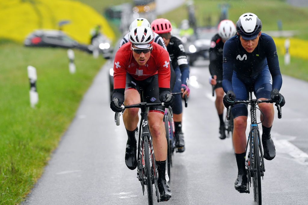 ESTAVAYER SWITZERLAND APRIL 30 Stefan Kung of Switzerland and Team Groupama FDJ Johan Jacobs of Switzerland and Movistar Team on breakaway during the 74th Tour De Romandie 2021 Stage 3 a 1687km stage from Estavayer to Estavayer TDR2021 TDRnonstop UCIworldtour on April 30 2021 in Estavayer Switzerland Photo by Luc ClaessenGetty Images