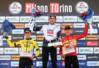 TURIN ITALY MARCH 19 LR Ben Tulett of The United Kingdom and Team Visma Lease a Bike on second place race winner Isaac Del Toro of Mexico and UAE Team Emirates XRG and Tobias Halland Johannessen of Norway and UnoX Mobility Team on third place pose on the podium ceremony after the 106th Milano Torino 2025 a 174km one day race from Rho to Torino Superga 670m on March 19 2025 in Turin Italy Photo by Dario BelingheriGetty Images