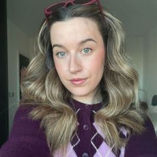 Junior beauty editor Grace Lindsay testing a GHD curling wand