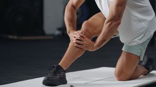 Stretches for bigger squat: knee flexion stretch