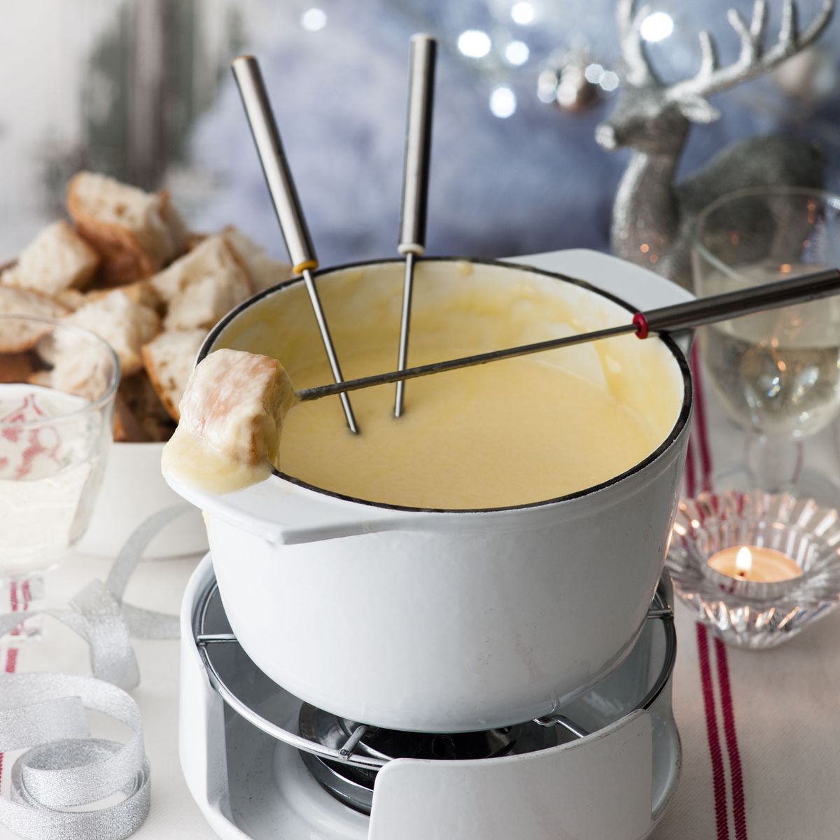 Try this retro kirsch cheese fondue starter idea to bring your family together this Christmas