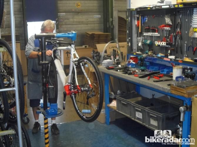 Lapierre's factory in Dijon, France, doesn't have a traditional assembly line. Each bike is assembled by one mechanic at a workstation like this