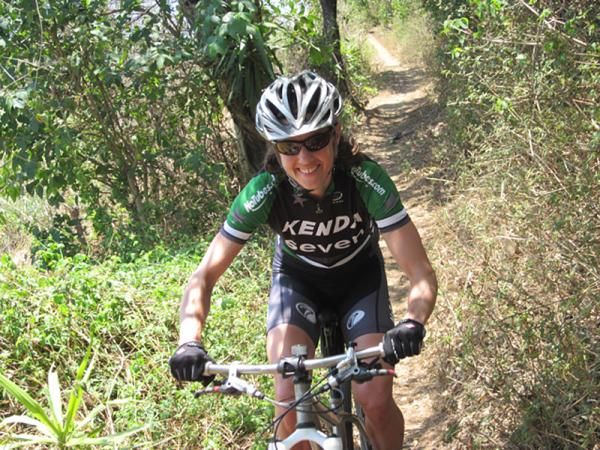 Mary McConneloug rides a trail in Guatemala