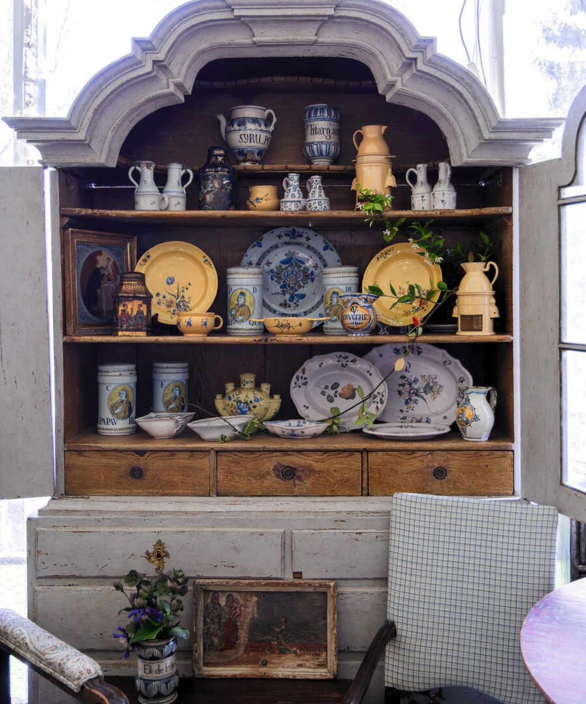 A dresser with china at The Ticking Tent