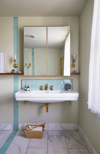 Neutral bathroom with pastel blue tiles