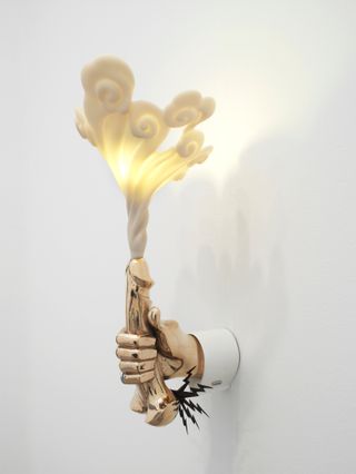 Hand holding a light