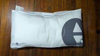 The cloth bag that contains our reviewer's the Sleep Number NaturalFit Ultimate Pillow