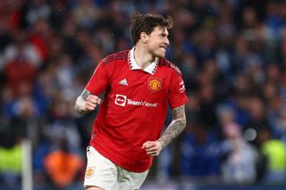 Manchester United's Victor Lindelof celebrates after his penalty wins the Emirates FA Cup Semi Final match between Brighton & Hove Albion and Manchester United at Wembley Stadium on April 23, 2023 in London, England.
