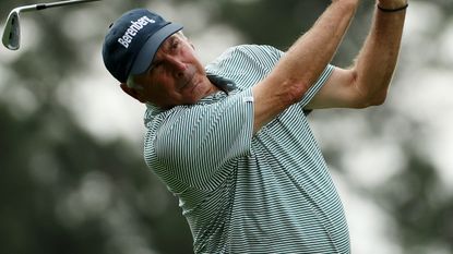 Fred Couples takes a shot during the opening round of the 2023 Masters