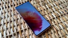 A photograph of the Samsung Galaxy S21 5G on a wicker basket