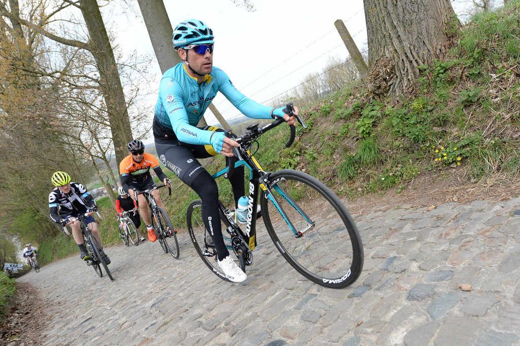 An Astana rider on the cobbles