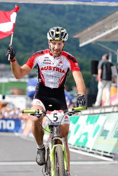 Alban Lakata (Austria) crosses the finish in second place.