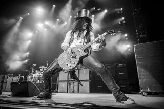 Slash: "Slash was opening up for Ozzy that night and although I was only allowed to shoot the first three songs, Slash’s demeanor on stage is such that it’s really hard to get a bad shot!"