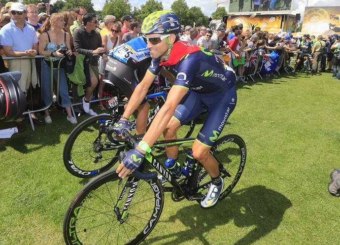 Alejandro Valverde (Movistar) rides to the start with a red bandana