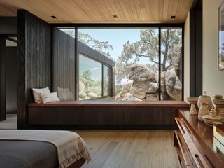 Bedroom desert views at High Desert Retreat by Aidlin Darling Design
