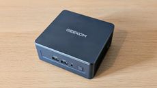 The Geekom Mini IT13 on a desk
