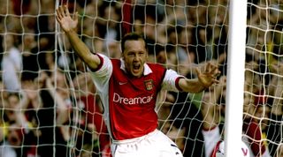 16 Oct 1999: Lee Dixon of Arsenal scores during the FA Carling Premiership match against Everton at Highbury in London, England. Arsenal won the match 4 - 1. \ Mandatory Credit: Phil Cole /Allsport
