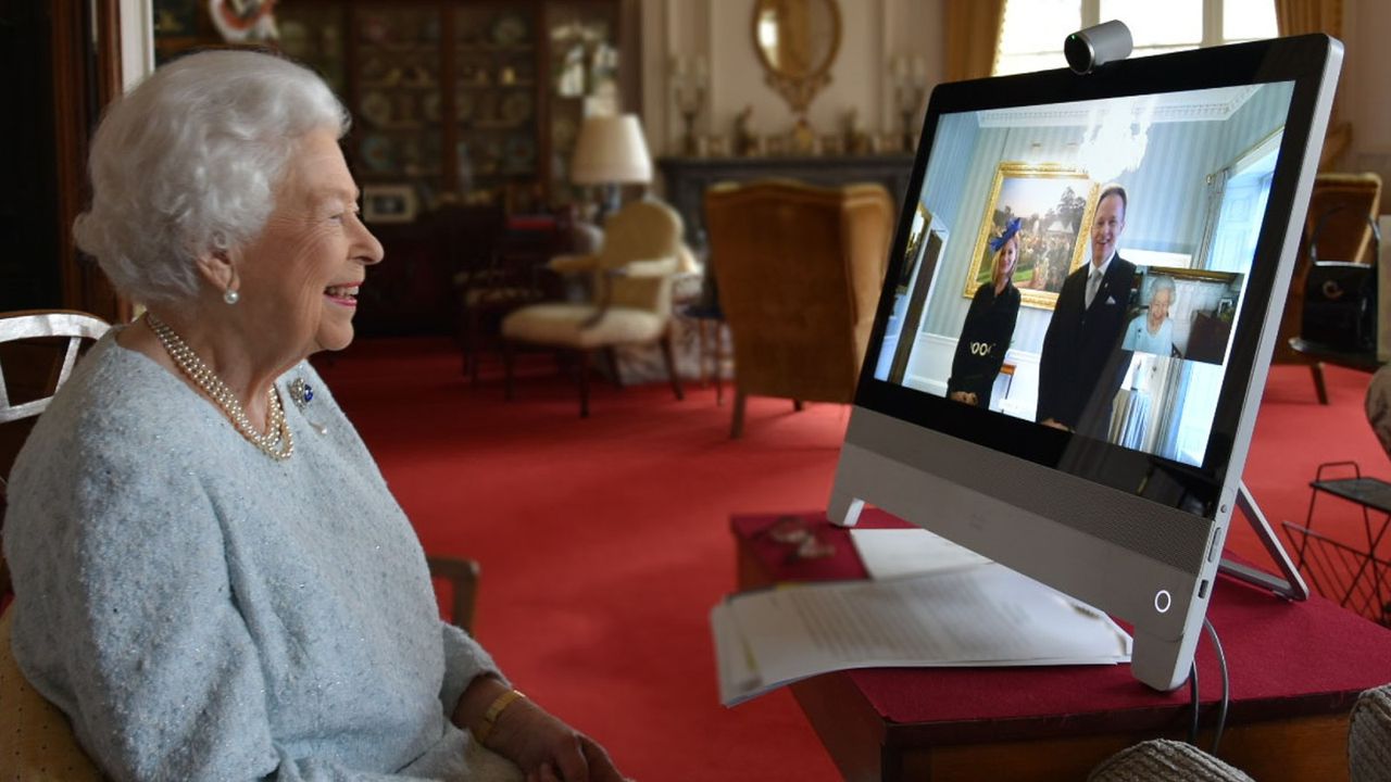 Buckingham Palace handout picture of Queen Elizabeth II, who is in residence at Windsor Castle, speaking by video link during a virtual diplomatic audience with His Excellency Dr. Ferenc Kumin, Ambassador of Hungary, and his wife, Viktoria, who were at London&#039;s Buckingham Palace where such audiences are traditionally held.