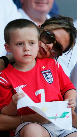 Victoria Beckham with her son Brooklyn