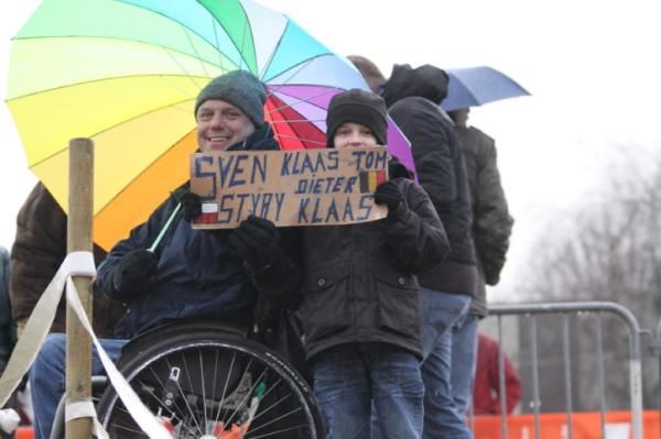 These cyclocross fans support different riders.