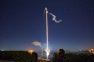 A SpaceX Falcon 9 rocket soars into space with 60 of the company's Starlink internet satellites in this long-exposure photo of the launch on Monday (Jan. 6). The rocket lifted off from Cape Canaveral Air Force Station in Florida at 9:19 p.m. EST (0219 GMT Tuesday) before returning to Earth for a drone-ship landing, marking the fourth time that this particular booster has flown.