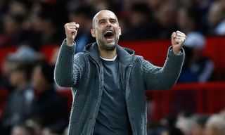 Pep Guardiola celebrates City's 2-0 derby success at Old Trafford