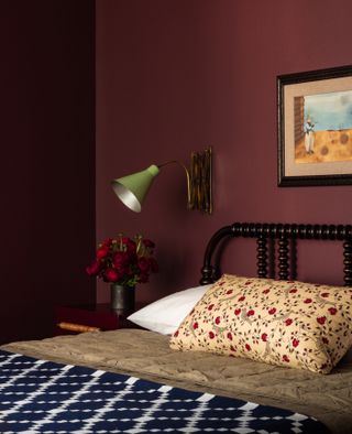 A small bedroom with Burgundy color