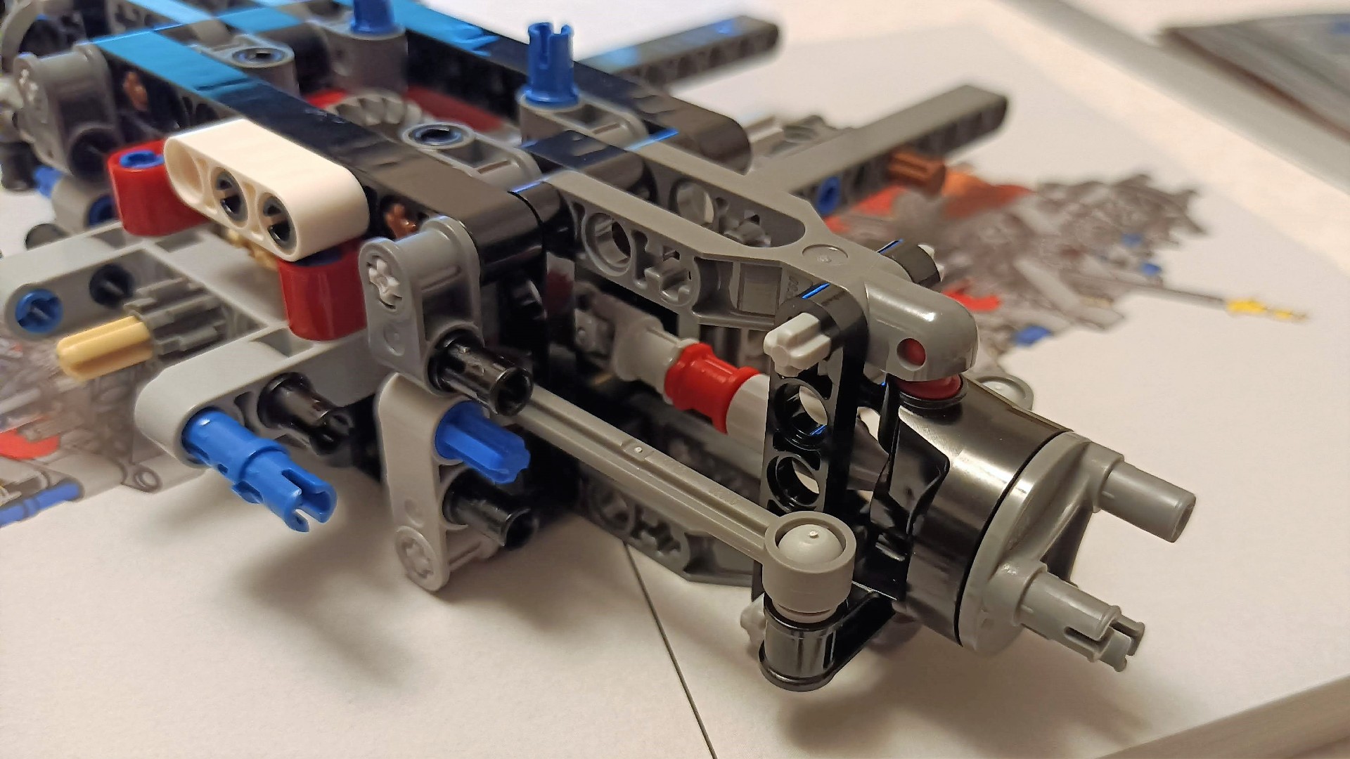 लेगो टेक्निक लैंड रोवर डिफेंडर 42110 - एक्सेल और कार के निलंबन का निर्माण।