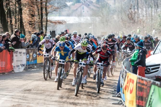 The elite men start their cross country race