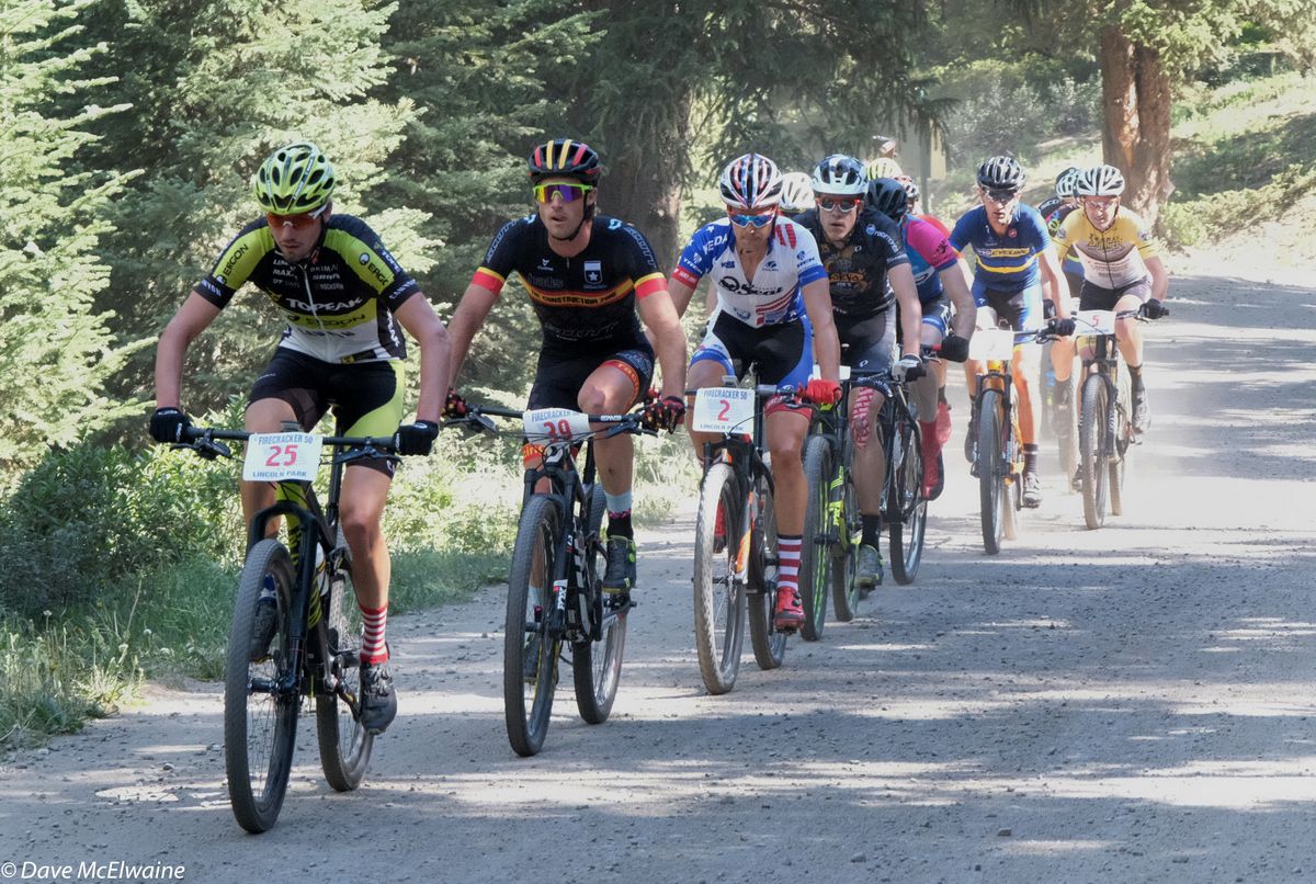 leading as the pro men started onto the dirt section of Boreas Pass Road