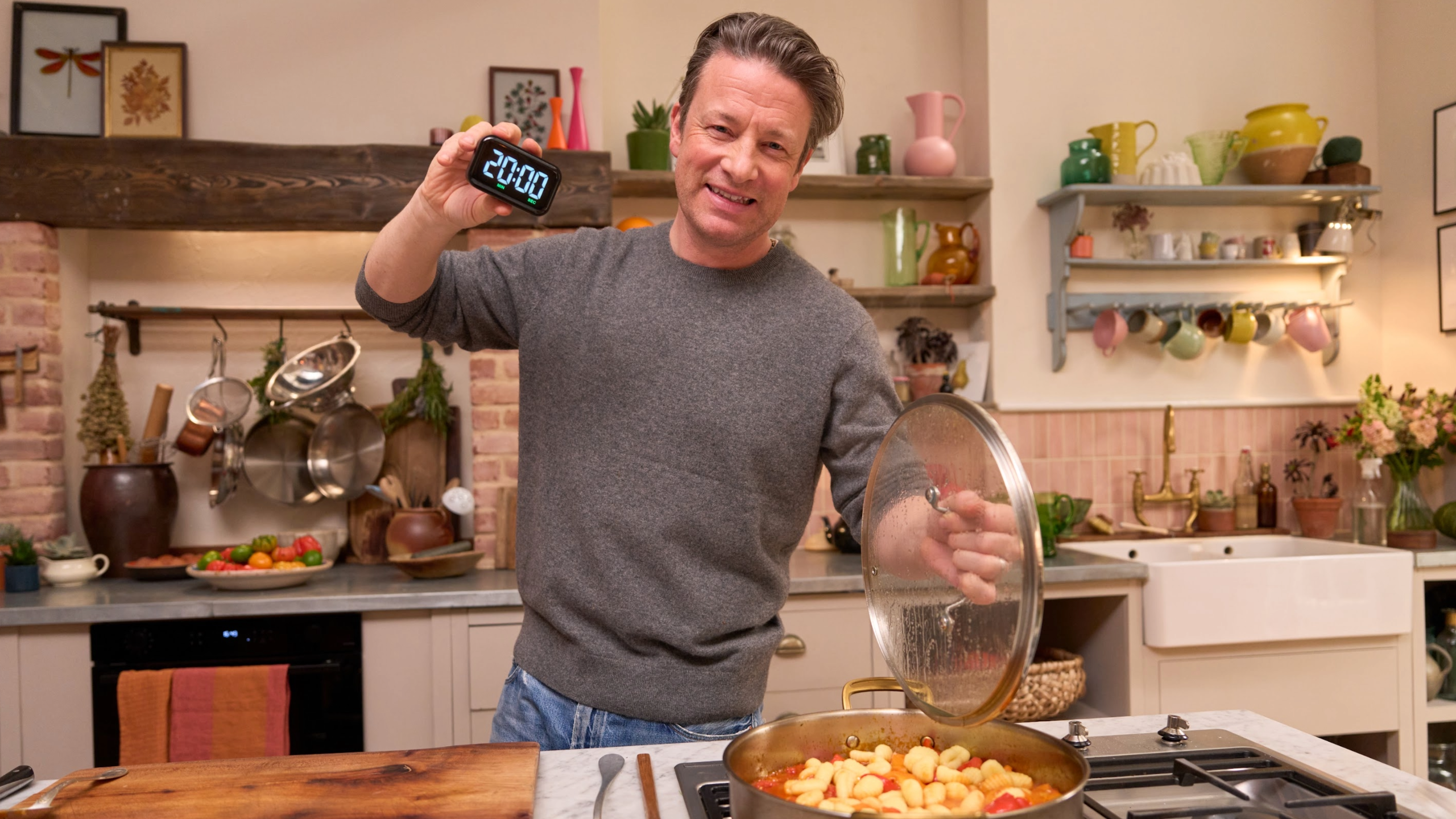 Jamie Oliver cooking for his 20 Minute Meals TV show 