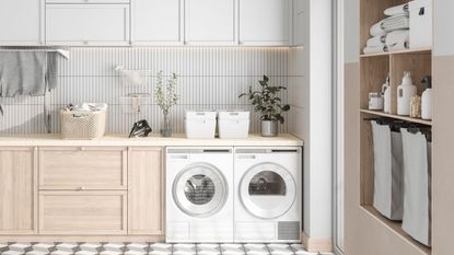 A laundry room with washer and dryer