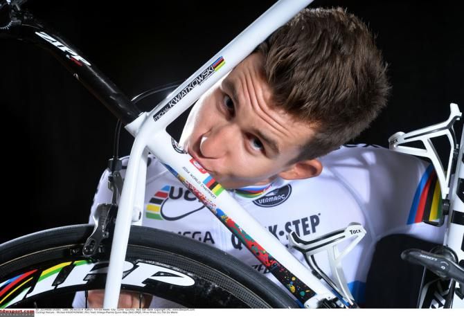 Michal Kwiatkowski kisses the Polish flag on his new bike