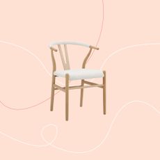 Wishbone chair on pink background