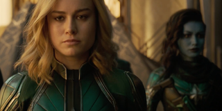 Captain Marvel walking with Starforce member Minn-Erva